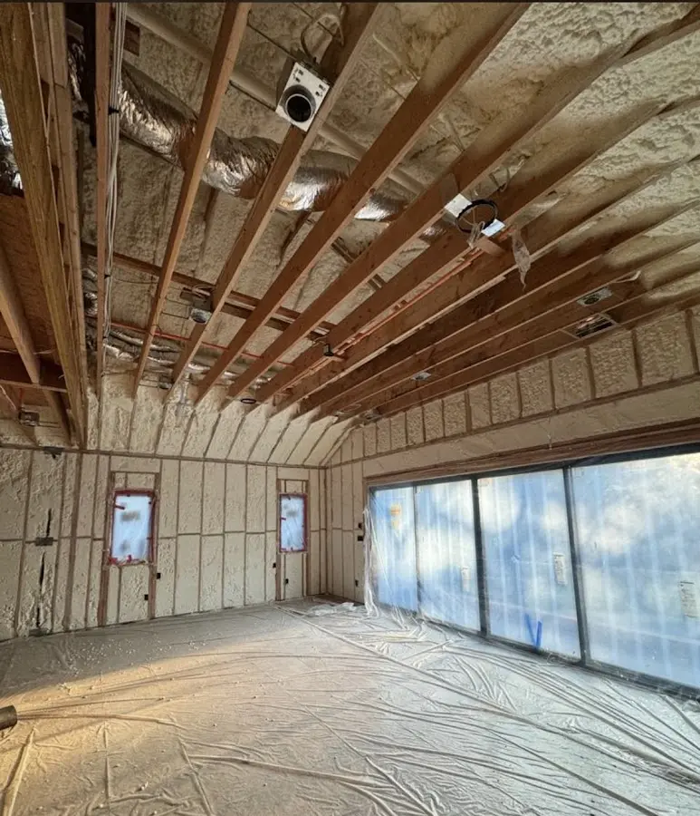 Interior walls and ceiling insulated with spray foam during new construction in West Linn